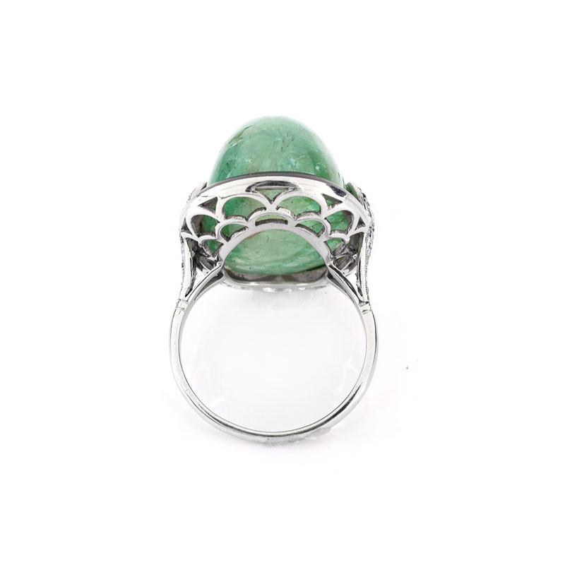 Estate Large Cabochon Emerald, Diamond, Black Onyx and 18 Karat White Gold Ring. Emerald measures 21mm x 14mm. 