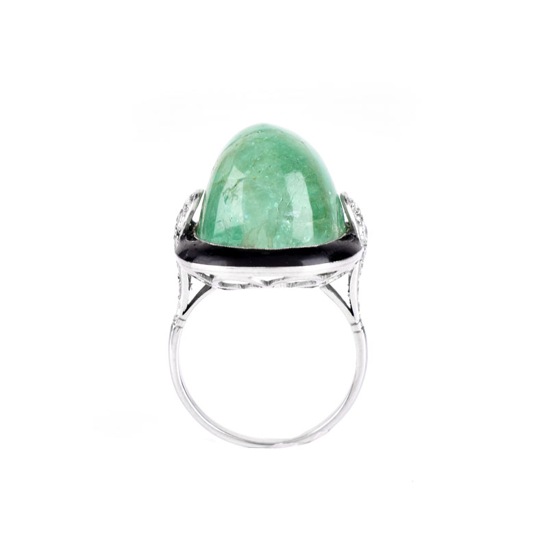 Estate Large Cabochon Emerald, Diamond, Black Onyx and 18 Karat White Gold Ring. Emerald measures 21mm x 14mm. 