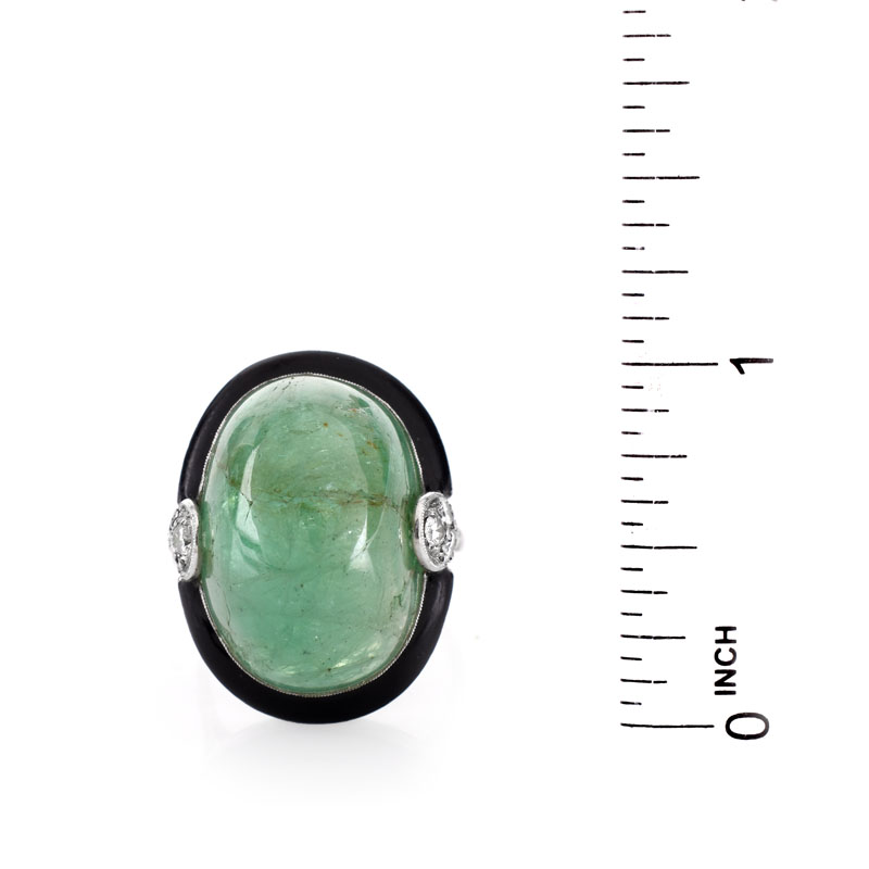 Estate Large Cabochon Emerald, Diamond, Black Onyx and 18 Karat White Gold Ring. Emerald measures 21mm x 14mm. 