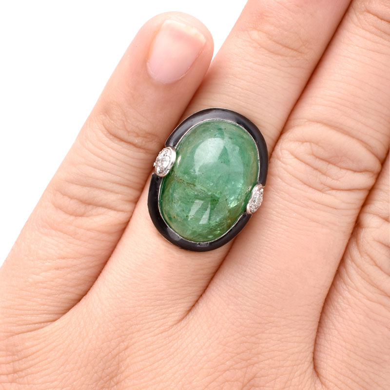 Estate Large Cabochon Emerald, Diamond, Black Onyx and 18 Karat White Gold Ring. Emerald measures 21mm x 14mm. 