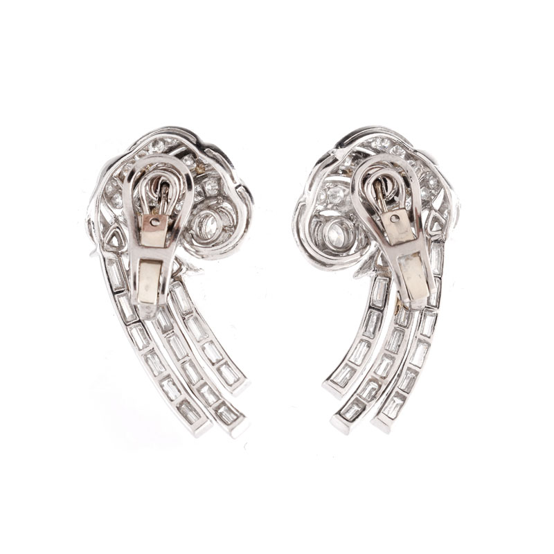 Approx. 5.50 Carat Round Brilliant, Trillion and Baguette Cut Diamond and Platinum Earrings.