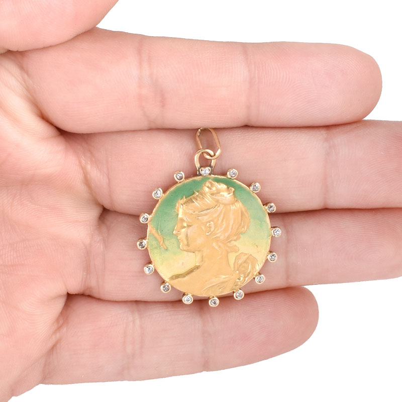 Circa 1893 Art Nouveau Rose Cut and Old European Cut Diamond and Enameled 14 Karat Yellow Gold Pendant with an image of Diana the Huntress.