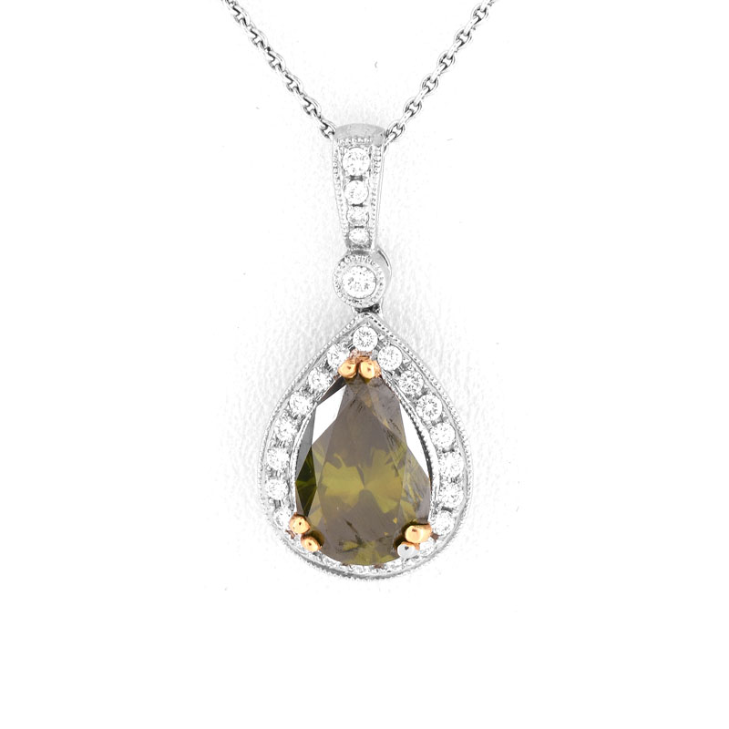 Approx. 3.10 Carat Pear Shape Green Diamond, .50 Carat Round Brilliant Cut Diamond and 18 Karat White Gold Pendant Necklace. 