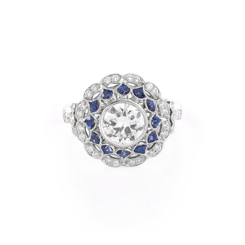 Art Deco style Approx. 1.09 Carat TW Diamond, .89 Carat Sapphire and Platinum Ring set in the Center with a .89 Carat Round Brilliant Cut Diamond.