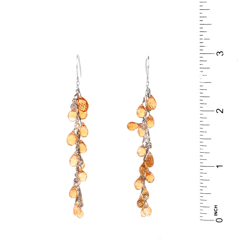 Briolette Cut Topaz and 14 Karat White Gold Chandelier Earrings. Very good condition.