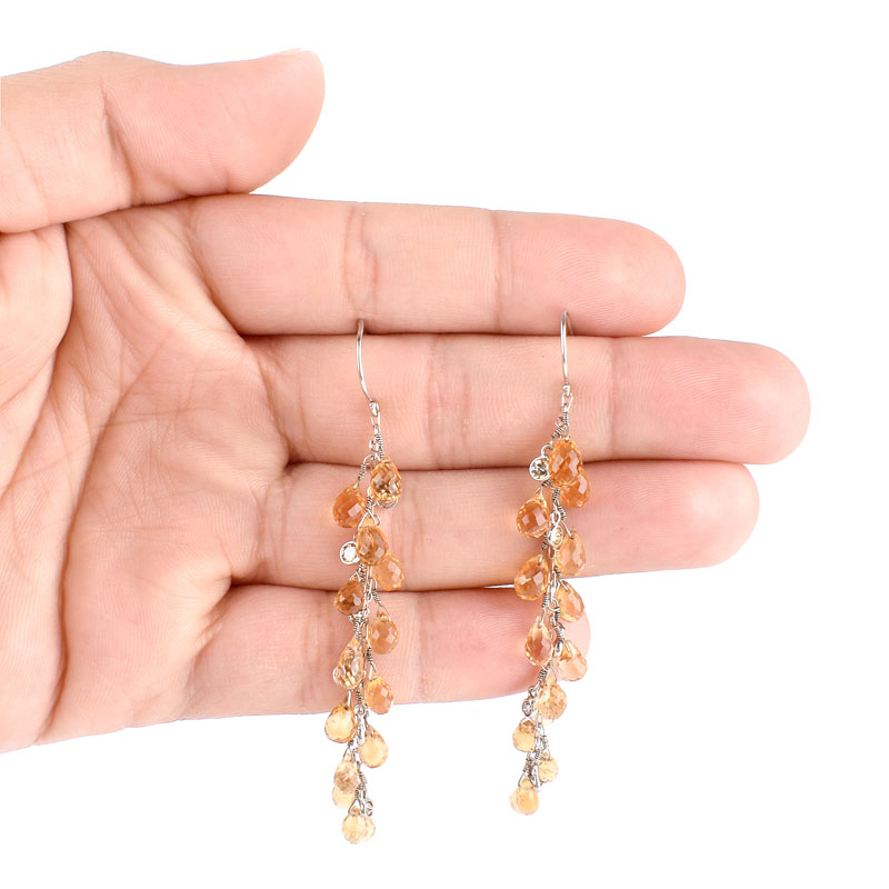 Briolette Cut Topaz and 14 Karat White Gold Chandelier Earrings. Very good condition.