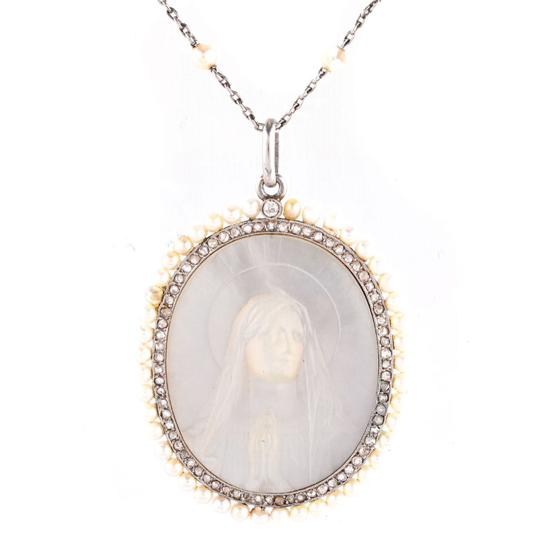 Antique Circa 1918 Platinum, Yellow Gold, Carved Mother of Pearl, Micro Pearl and Diamond Blessed Virgin / Madonna Pendant Necklace.