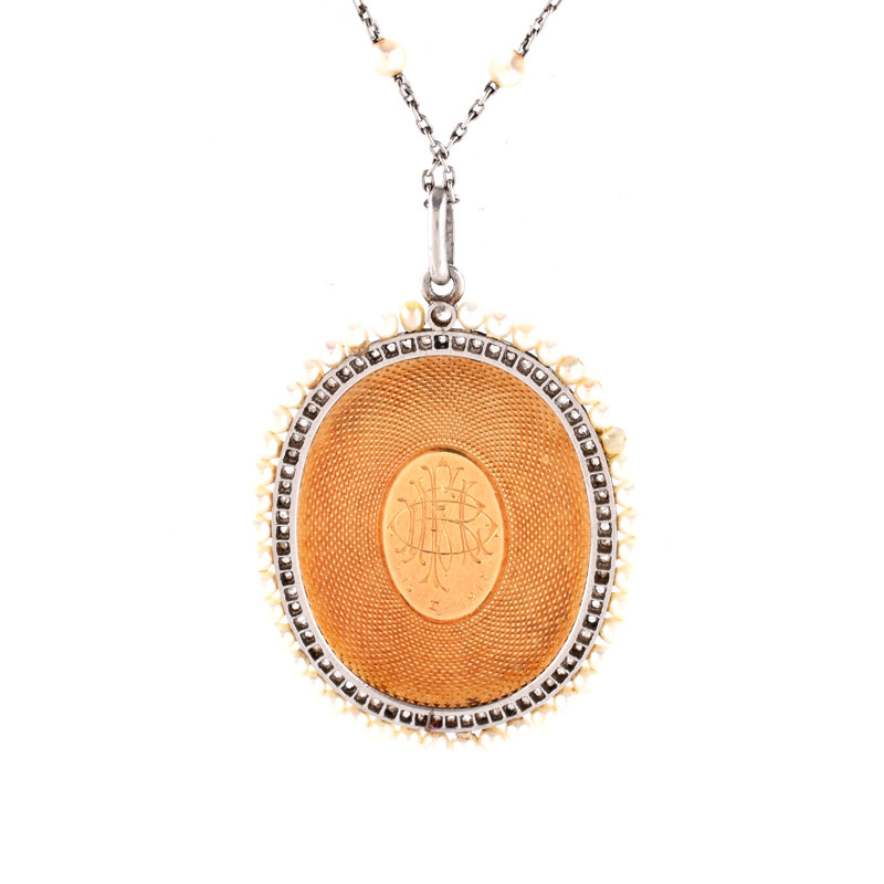 Antique Circa 1918 Platinum, Yellow Gold, Carved Mother of Pearl, Micro Pearl and Diamond Blessed Virgin / Madonna Pendant Necklace.