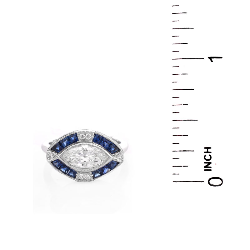 Art Deco style Approx. 1.05 Carat TW Diamond, .66 Carat Sapphire and Platinum Ring set in the Center with a .87 Carat Marquise Cut Diamond.