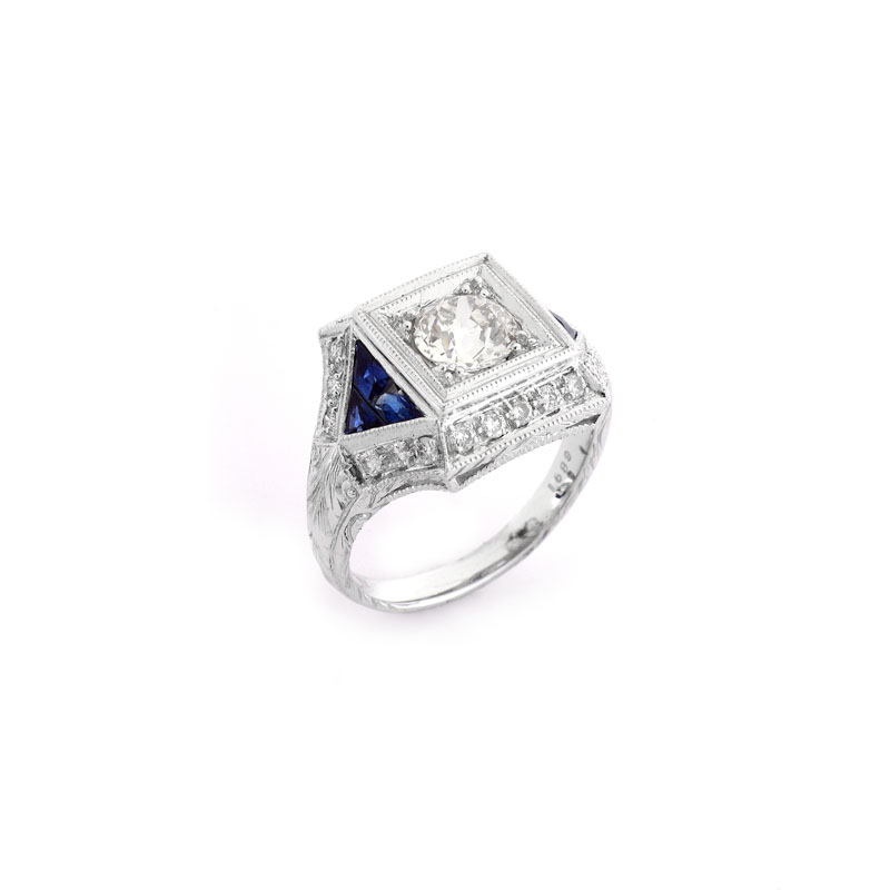 Art Deco style Approx. 1.16 Carat TW Diamond, .50 Carat Sapphire and Platinum Ring set in the Center with a .84 Carat Round Brilliant Cut Diamond.