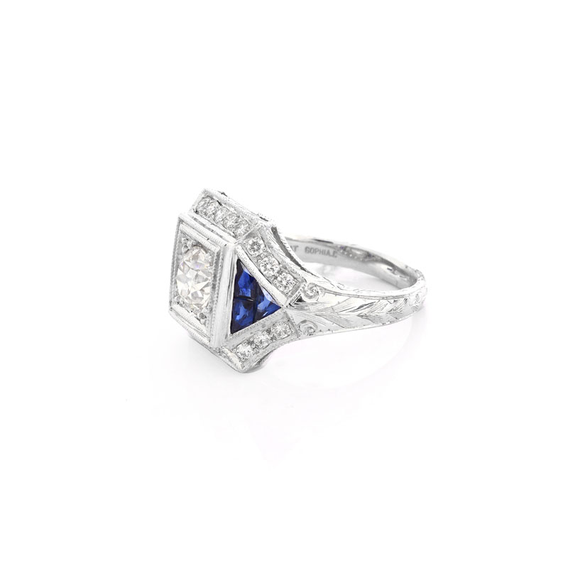Art Deco style Approx. 1.16 Carat TW Diamond, .50 Carat Sapphire and Platinum Ring set in the Center with a .84 Carat Round Brilliant Cut Diamond.