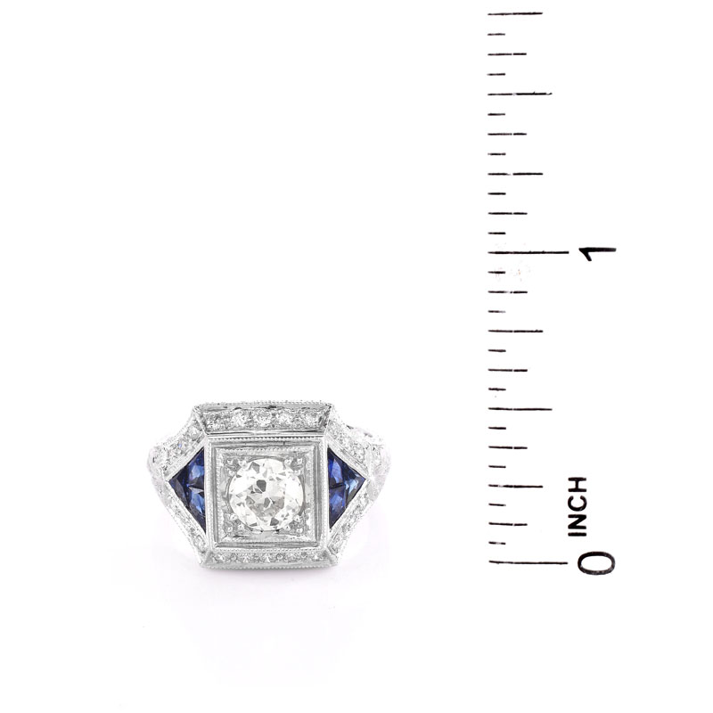 Art Deco style Approx. 1.16 Carat TW Diamond, .50 Carat Sapphire and Platinum Ring set in the Center with a .84 Carat Round Brilliant Cut Diamond.