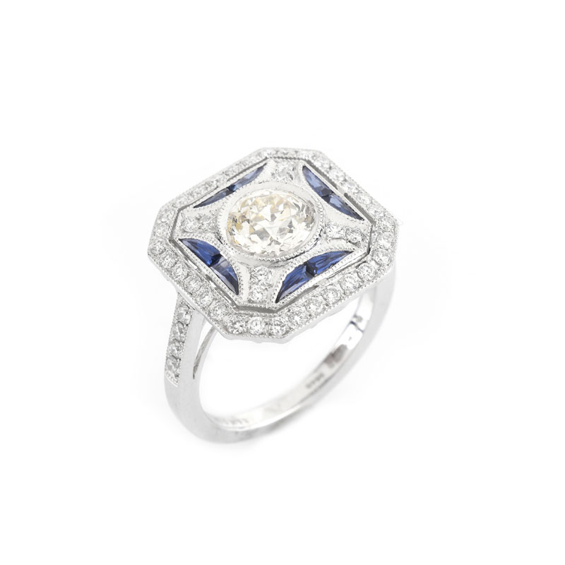 Art Deco style Approx. 1.51 Carat TW Diamond, .36 Carat Sapphire and Platinum Ring set in the Center with a 1.01 Carat Round Brilliant Cut Diamond. 