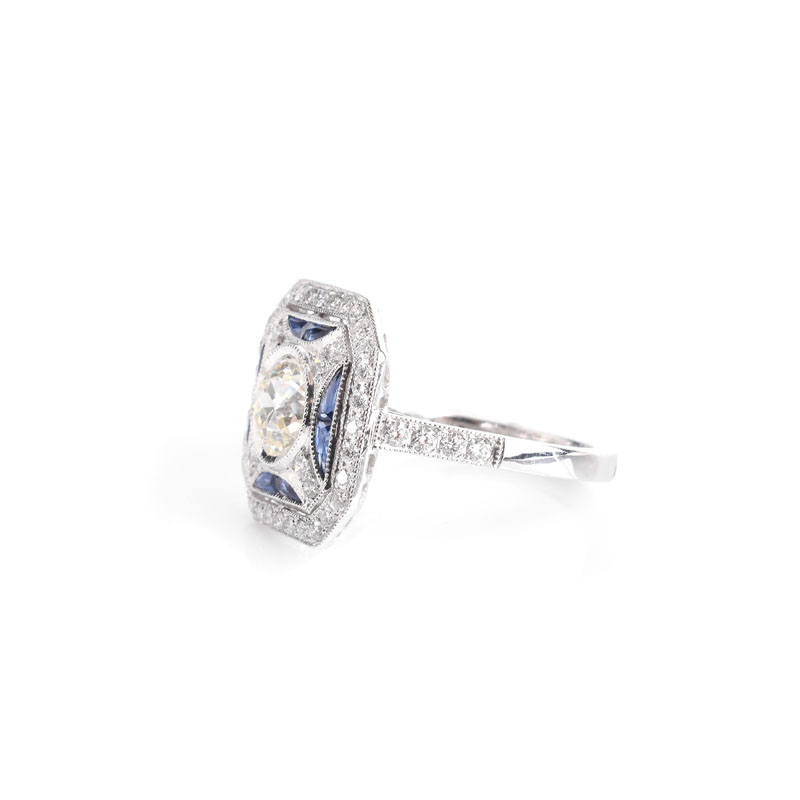 Art Deco style Approx. 1.51 Carat TW Diamond, .36 Carat Sapphire and Platinum Ring set in the Center with a 1.01 Carat Round Brilliant Cut Diamond. 