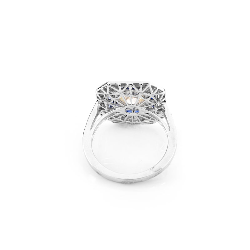 Art Deco style Approx. 1.51 Carat TW Diamond, .36 Carat Sapphire and Platinum Ring set in the Center with a 1.01 Carat Round Brilliant Cut Diamond. 