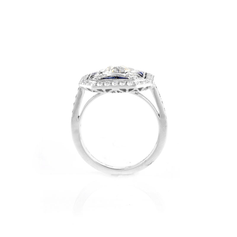 Art Deco style Approx. 1.51 Carat TW Diamond, .36 Carat Sapphire and Platinum Ring set in the Center with a 1.01 Carat Round Brilliant Cut Diamond. 