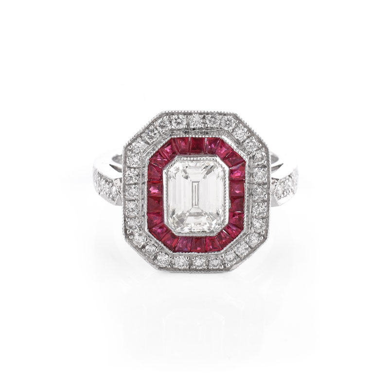 Art Deco style Approx. 1.56 Carat TW Diamond, .60 Carat Ruby and Platinum Ring set in the Center with a 1.21 Carat Emerald Cut Diamond.