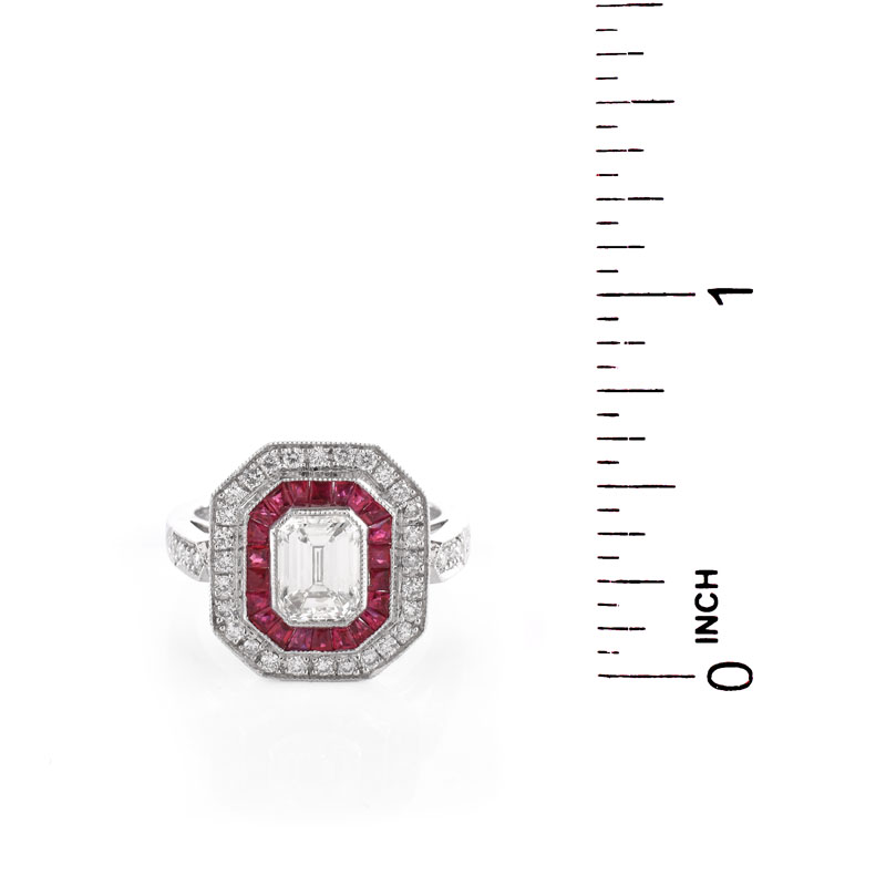 Art Deco style Approx. 1.56 Carat TW Diamond, .60 Carat Ruby and Platinum Ring set in the Center with a 1.21 Carat Emerald Cut Diamond.