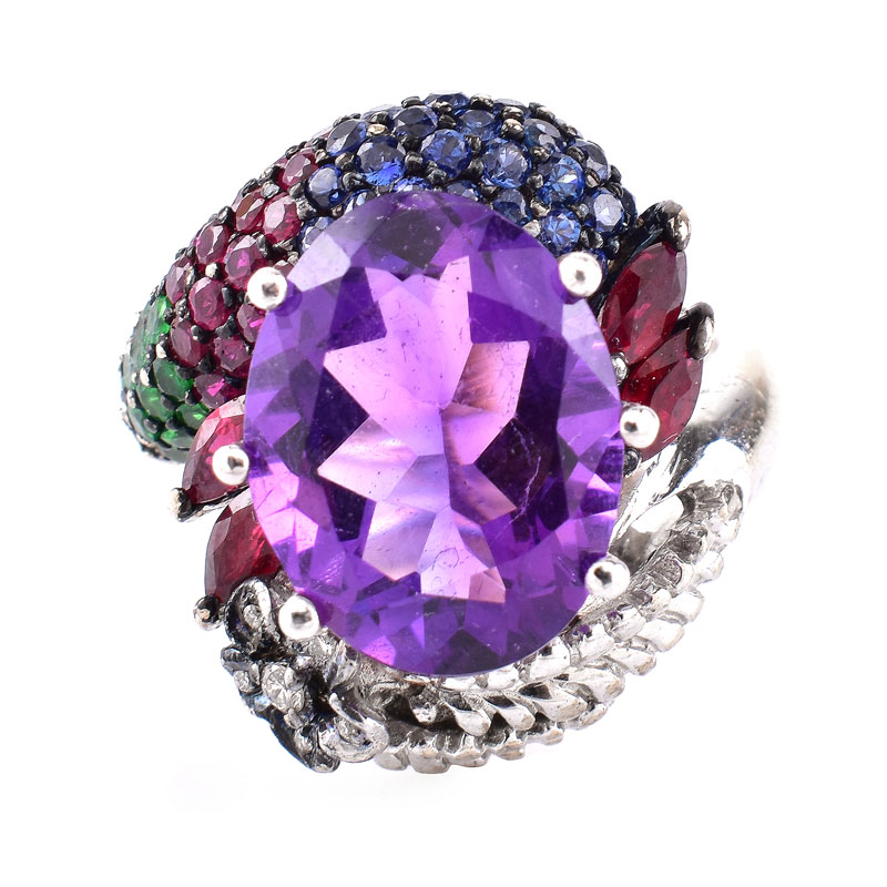 Vintage Approx. 8.70 Carat Oval Cut Amethyst, Pave Set Emerald, Sapphire and Ruby, Marquise Cut Ruby, Diamond and 18 Karat White Gold Ring. 