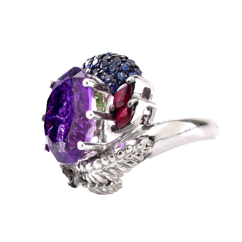 Vintage Approx. 8.70 Carat Oval Cut Amethyst, Pave Set Emerald, Sapphire and Ruby, Marquise Cut Ruby, Diamond and 18 Karat White Gold Ring. 