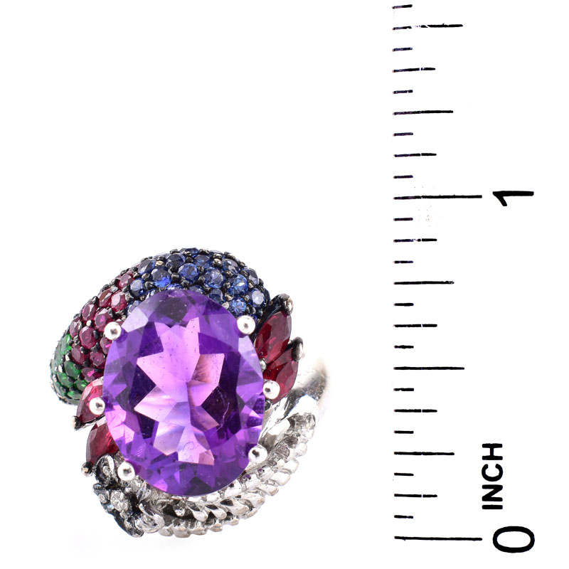 Vintage Approx. 8.70 Carat Oval Cut Amethyst, Pave Set Emerald, Sapphire and Ruby, Marquise Cut Ruby, Diamond and 18 Karat White Gold Ring. 