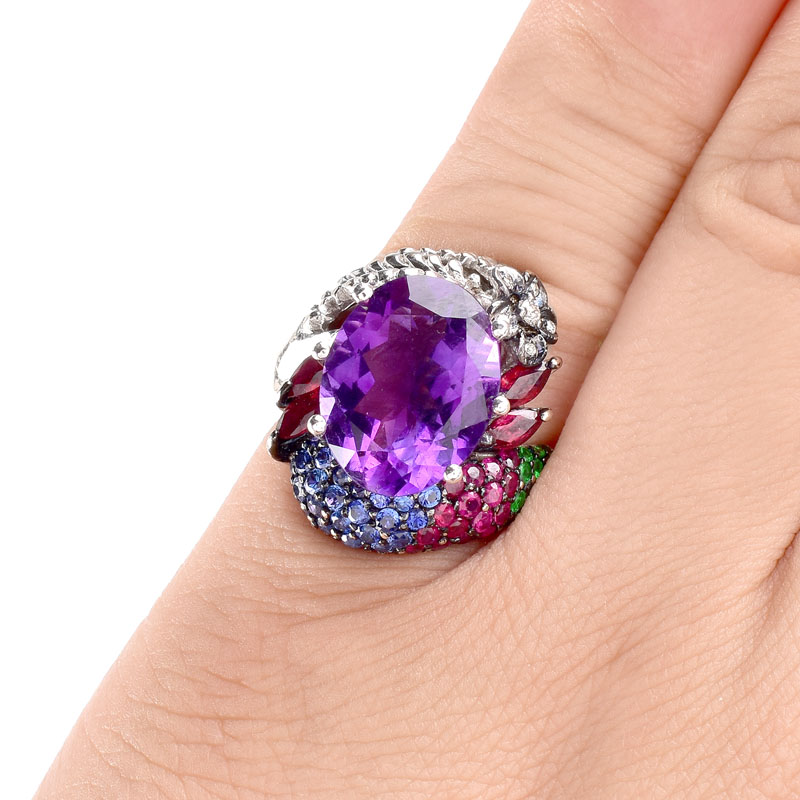 Vintage Approx. 8.70 Carat Oval Cut Amethyst, Pave Set Emerald, Sapphire and Ruby, Marquise Cut Ruby, Diamond and 18 Karat White Gold Ring. 