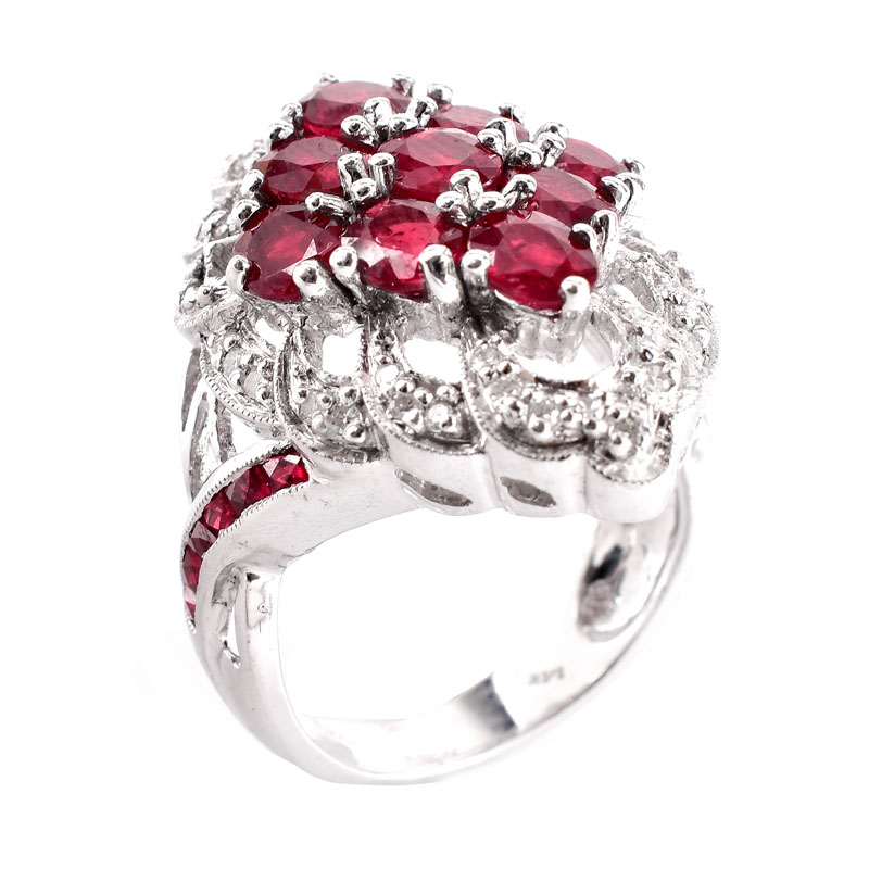 Approx. 4.50 Carat Oval Cut Ruby, 2.26 Carat Pave Set Diamond and 14 Karat White Gold Ring. Rubies with vivid color. 