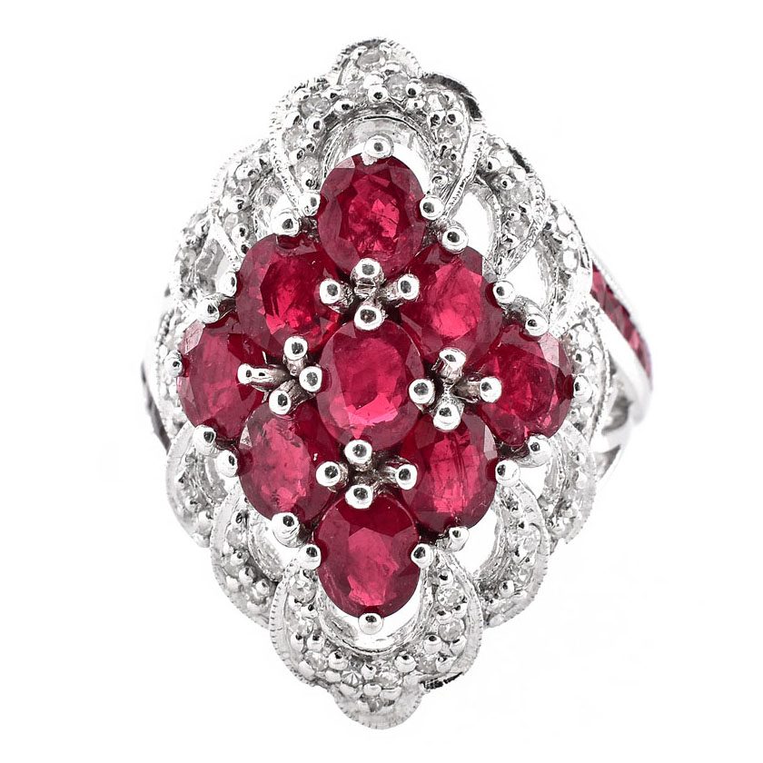 Approx. 4.50 Carat Oval Cut Ruby, 2.26 Carat Pave Set Diamond and 14 Karat White Gold Ring. Rubies with vivid color. 