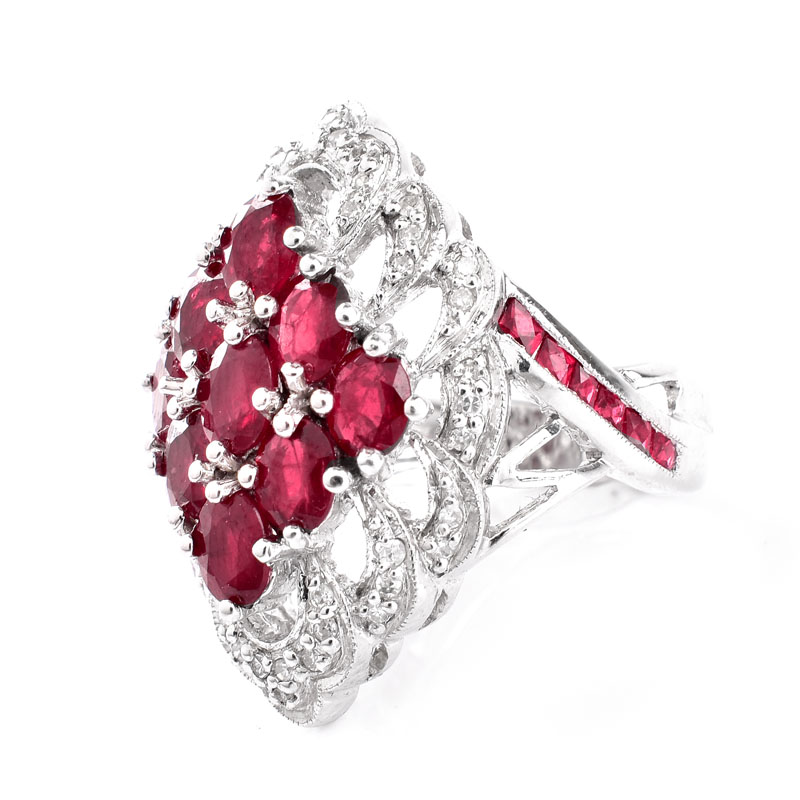 Approx. 4.50 Carat Oval Cut Ruby, 2.26 Carat Pave Set Diamond and 14 Karat White Gold Ring. Rubies with vivid color. 