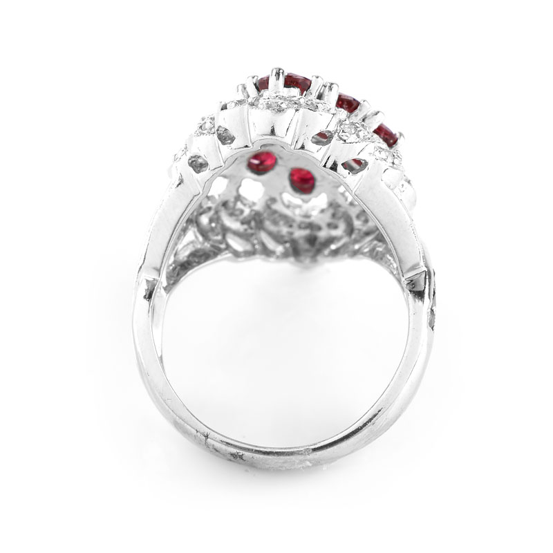 Approx. 4.50 Carat Oval Cut Ruby, 2.26 Carat Pave Set Diamond and 14 Karat White Gold Ring. Rubies with vivid color. 