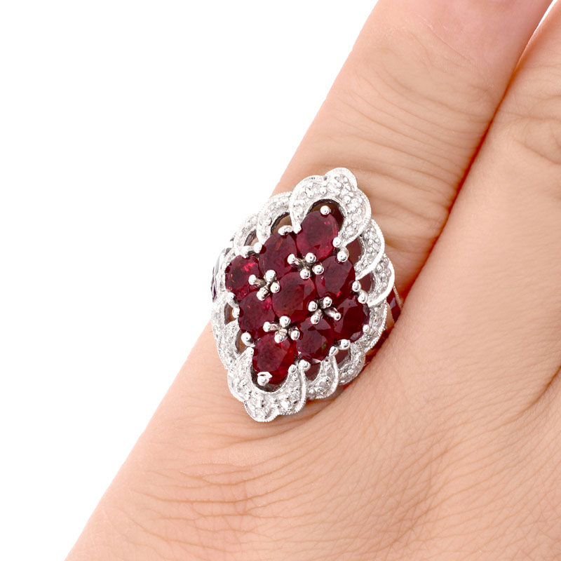 Approx. 4.50 Carat Oval Cut Ruby, 2.26 Carat Pave Set Diamond and 14 Karat White Gold Ring. Rubies with vivid color. 