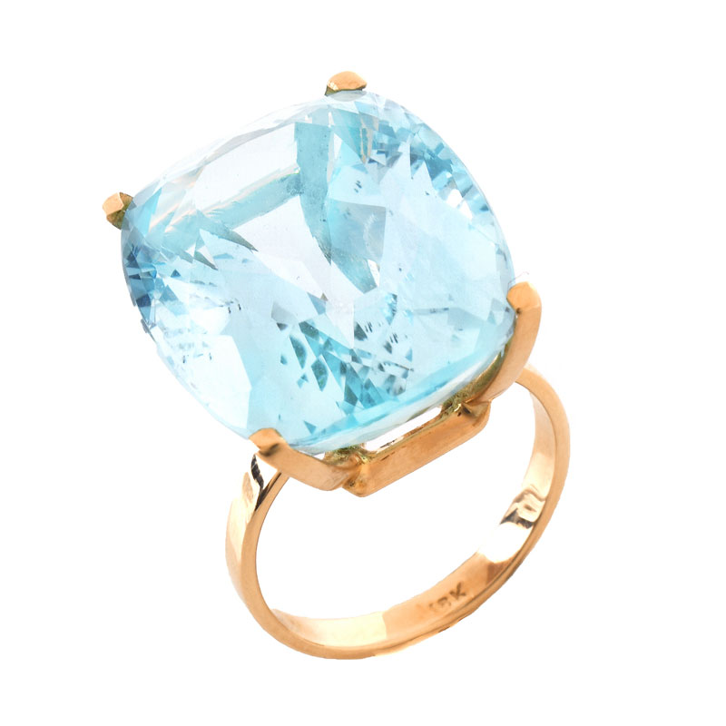 Approx. 29.0 Carat Cushion Cut Aquamarine and 18 Karat Rose Gold Ring. Aquamarine measures 21mm x 17mm, vivid color.