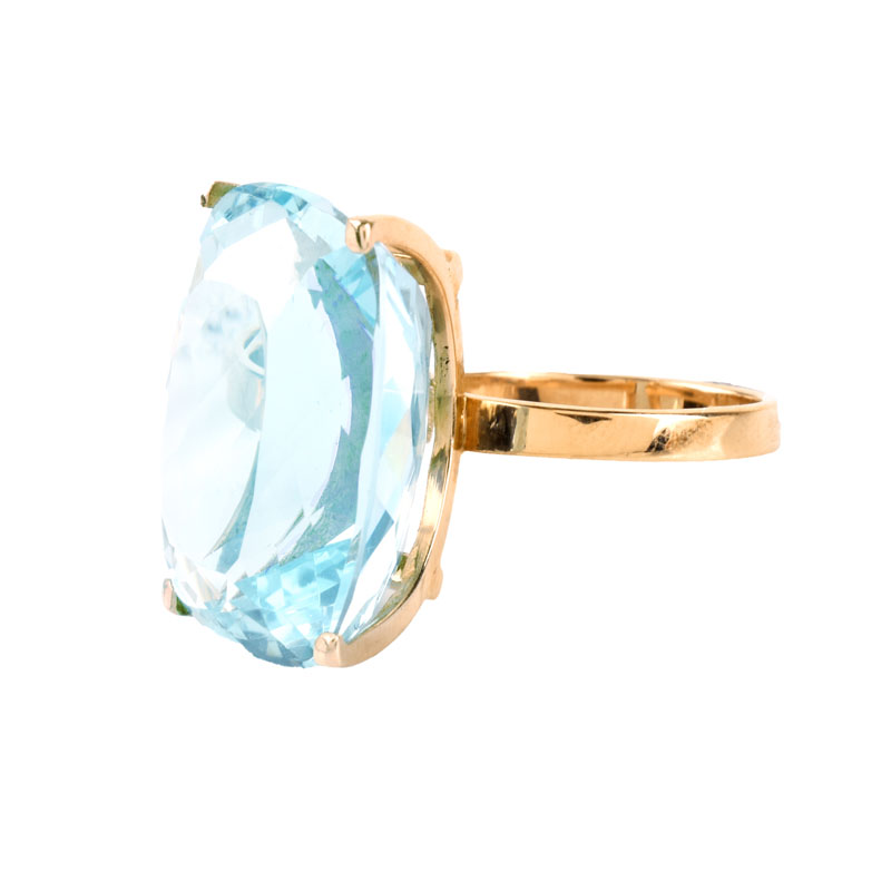 Approx. 29.0 Carat Cushion Cut Aquamarine and 18 Karat Rose Gold Ring. Aquamarine measures 21mm x 17mm, vivid color.