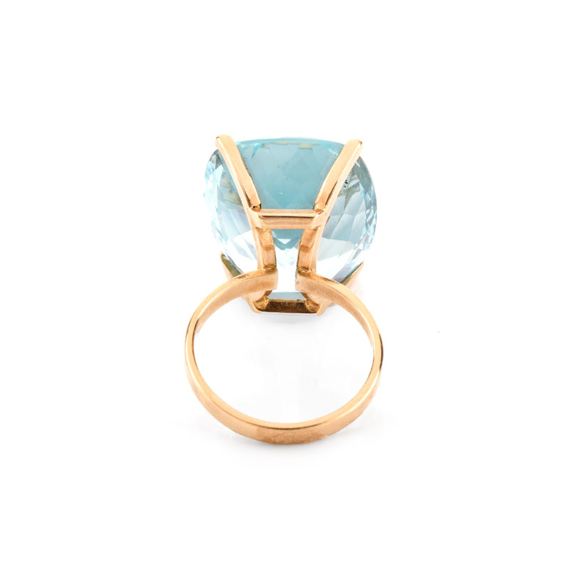 Approx. 29.0 Carat Cushion Cut Aquamarine and 18 Karat Rose Gold Ring. Aquamarine measures 21mm x 17mm, vivid color.