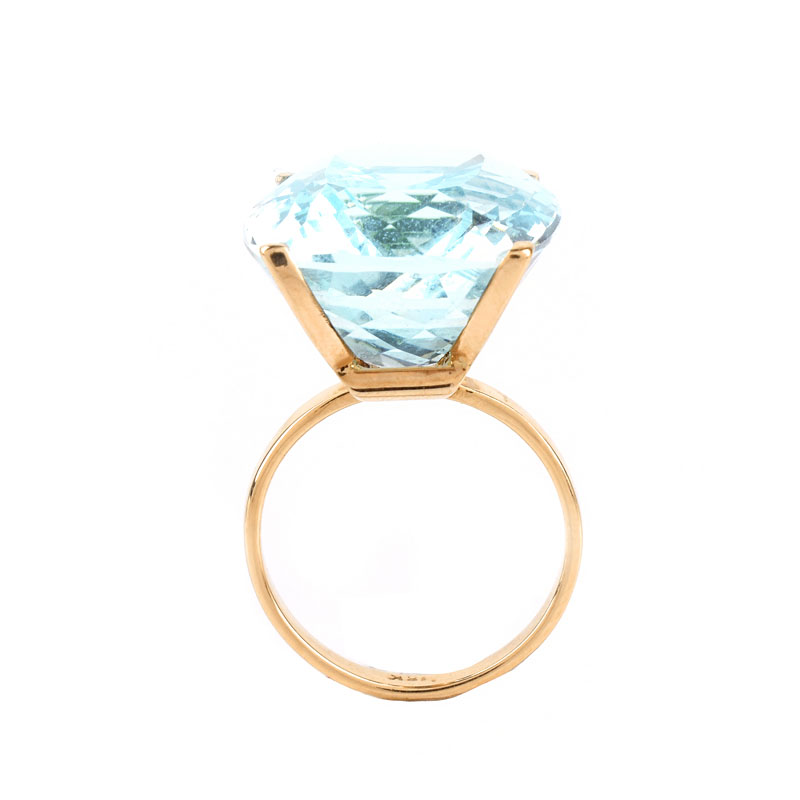 Approx. 29.0 Carat Cushion Cut Aquamarine and 18 Karat Rose Gold Ring. Aquamarine measures 21mm x 17mm, vivid color.