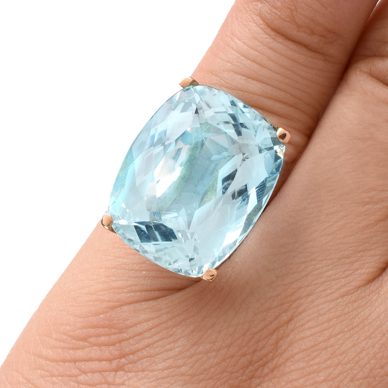 Approx. 29.0 Carat Cushion Cut Aquamarine and 18 Karat Rose Gold Ring. Aquamarine measures 21mm x 17mm, vivid color.