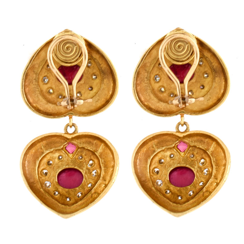 Vintage Cabochon Ruby, Pave Set Round Brilliant Cut Diamond and 14 Karat Yellow Gold Pendant Earrings. Diamonds D-E color, VS1 clarity. 