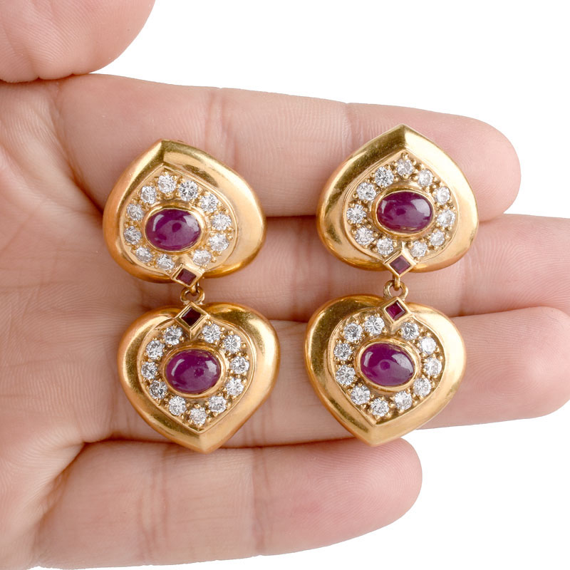 Vintage Cabochon Ruby, Pave Set Round Brilliant Cut Diamond and 14 Karat Yellow Gold Pendant Earrings. Diamonds D-E color, VS1 clarity. 