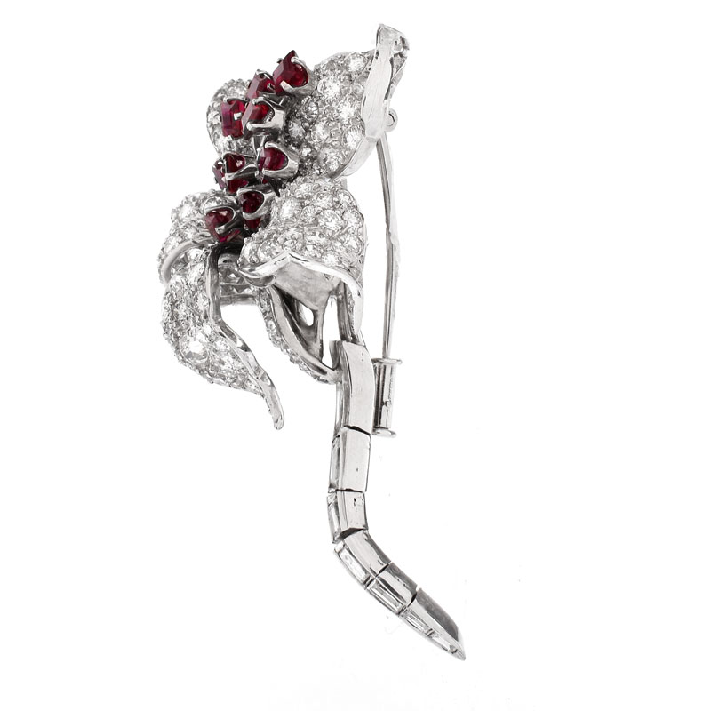 Vintage David Webb Approx. 6.50 Carat Pave Set Round Brilliant and Baguette Cut Diamond, Square Cut Ruby and Platinum Flower Brooch with Articulated Stem. 