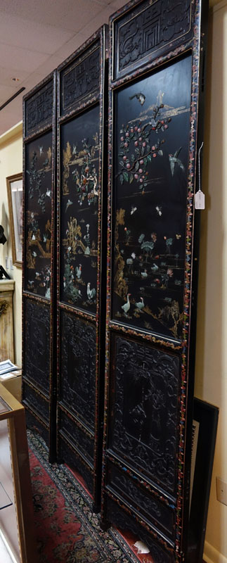 Important Palace-Size Late 19th or Early 20th Century Chinese Black Lacquer Wood, Deep Relief Carved Six Panel Screen Inlaid with Jade, Carnelian, and Rose Quartz. 