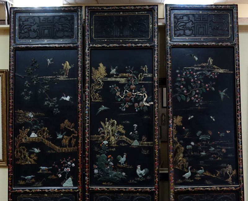 Important Palace-Size Late 19th or Early 20th Century Chinese Black Lacquer Wood, Deep Relief Carved Six Panel Screen Inlaid with Jade, Carnelian, and Rose Quartz. 