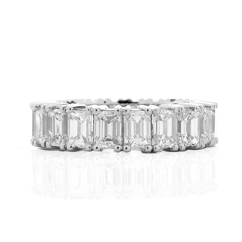 Fine Quality Approx. 6.75 carat Emerald Cut Diamond and Platinum Eternity Band.