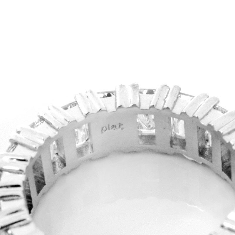 Fine Quality Approx. 6.75 carat Emerald Cut Diamond and Platinum Eternity Band.