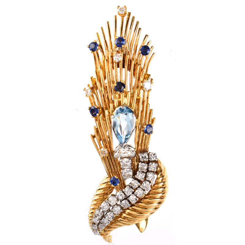 Vintage Round Brilliant Cut Diamond, Round Cut Sapphire, Pear Shape Aquamarine and 14 Karat Yellow Gold Brooch. 