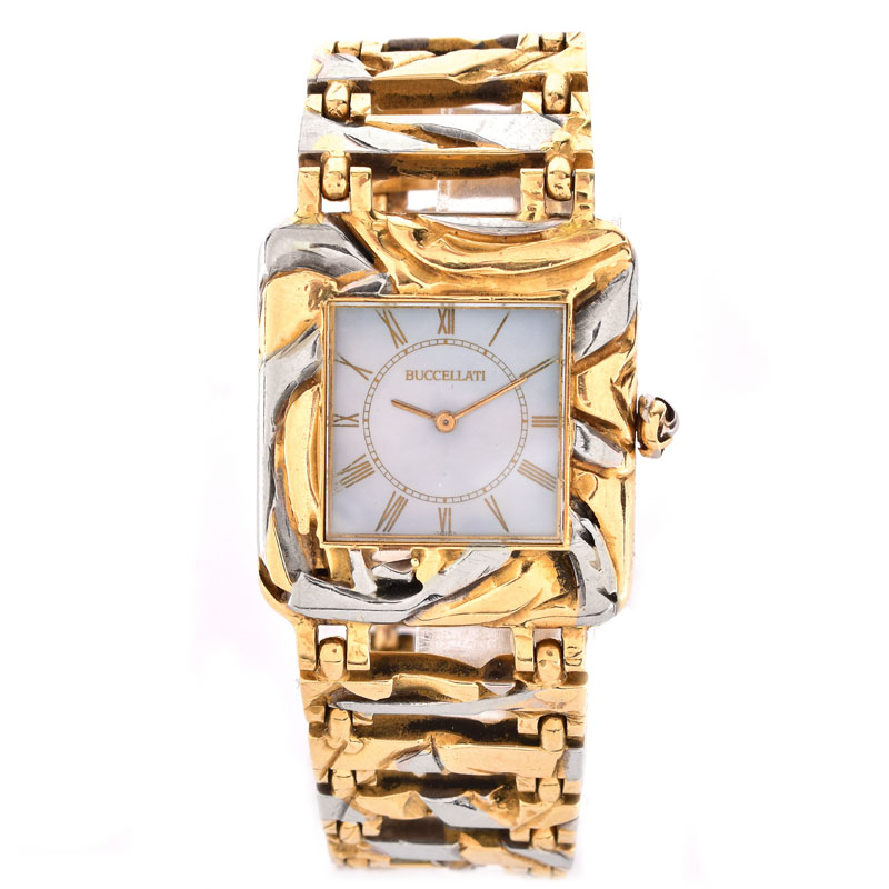 Man's Circa 1973 Buccellati Two Tone 18 Karat Gold Bracelet Watch with Mother of Pearl Dial and Manual Movement.