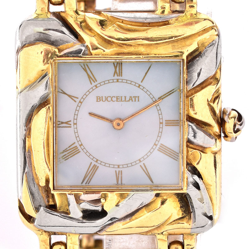 Man's Circa 1973 Buccellati Two Tone 18 Karat Gold Bracelet Watch with Mother of Pearl Dial and Manual Movement.