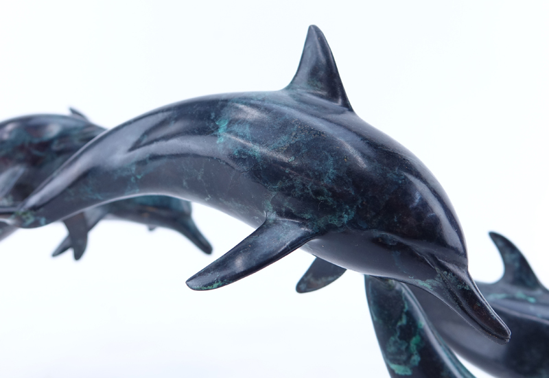 WW. Carmean, American (20th C.) Patinated Bronze Sculpture, Dolphins in Flight, Signed, Numbered 2/200 and Dated 1983. 