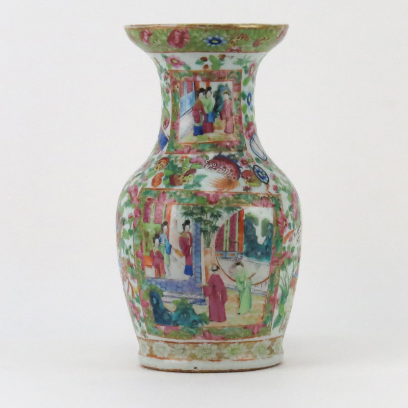 Late 19th Century Rose Canton Export ware Porcelain Vase. Enamel painted with vignettes of courtyard scenes on front and obverse side, various exotic flowers and animal motif.