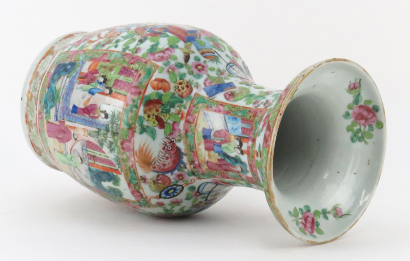 Late 19th Century Rose Canton Export ware Porcelain Vase. Enamel painted with vignettes of courtyard scenes on front and obverse side, various exotic flowers and animal motif.