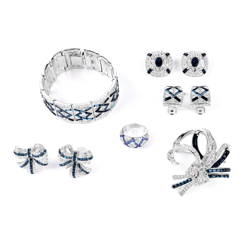 Collection of Nolan Miller  Faux Gemstone and Silver Tone Costume Jewelry  Including Bracelet, Brooch, Ring and Three Pair of Clip Earrings. 